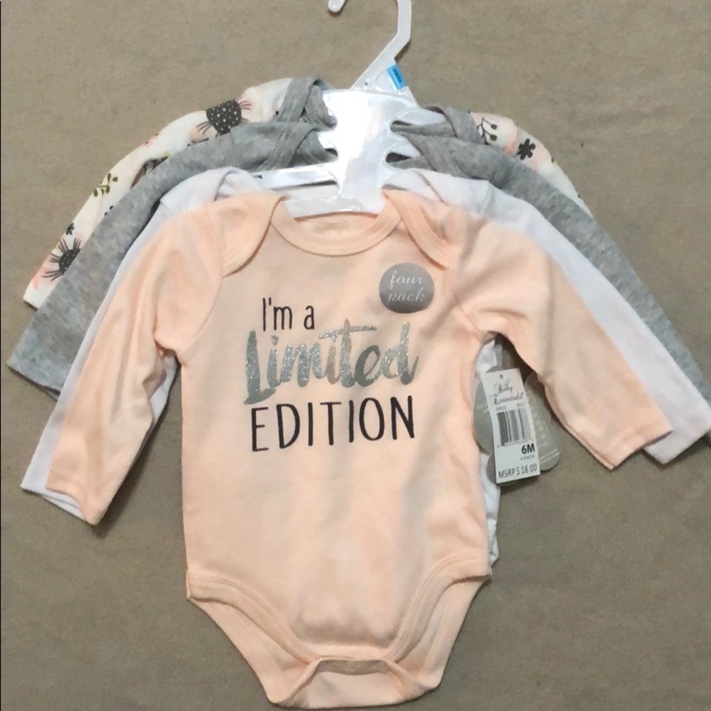 NWT Baby Essentials 4 pack bodysuits. 6m